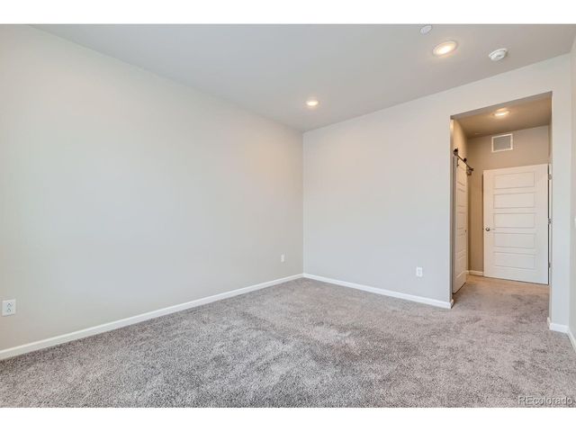 6153 N Ceylon St 10-303, Denver, CO 80249