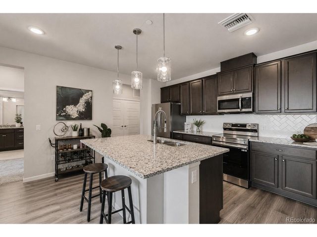 6153 N Ceylon St 10-303, Denver, CO 80249