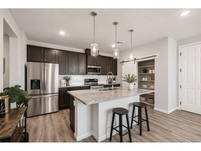 6153 N Ceylon St 10-303, Denver, CO 80249