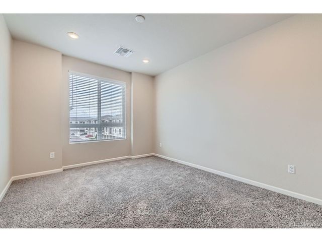 6153 N Ceylon St 10-303, Denver, CO 80249