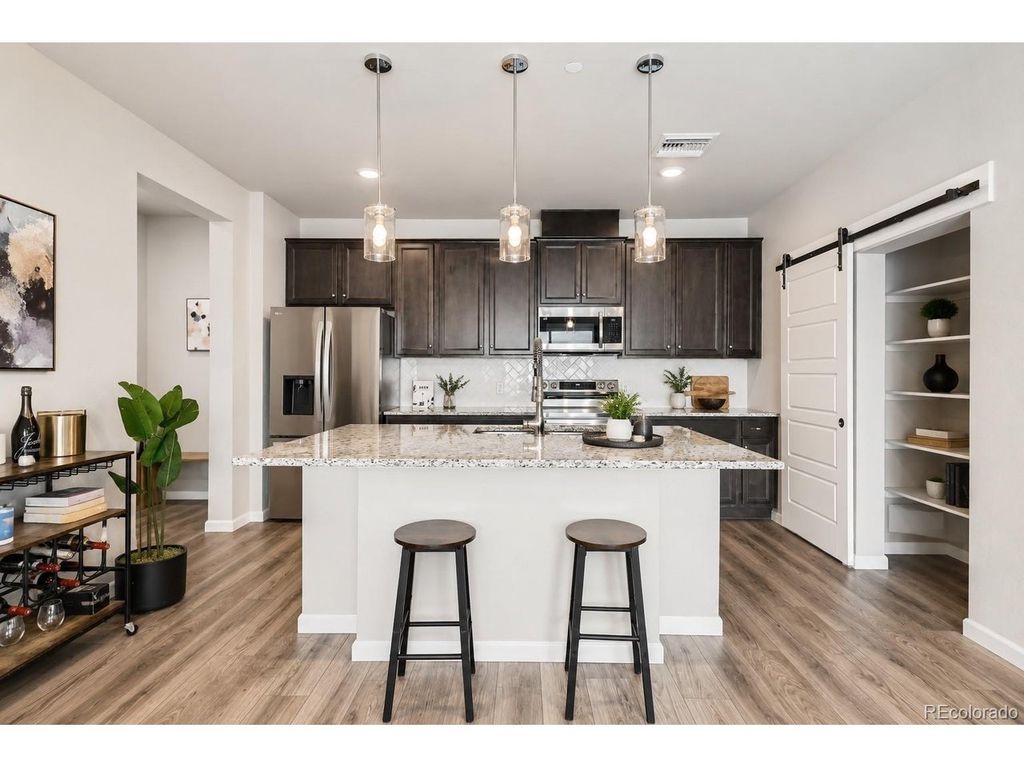 6153 N Ceylon St 10-303, Denver, CO 80249