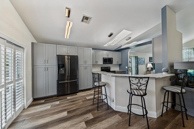 126 HAMMOCKS Drive, Greenacres, FL 33413