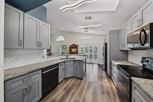 126 HAMMOCKS Drive, Greenacres, FL 33413