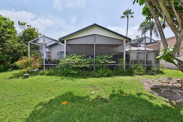 126 HAMMOCKS Drive, Greenacres, FL 33413