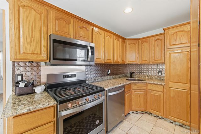 403 Brookside Court, Copiague, NY 11726