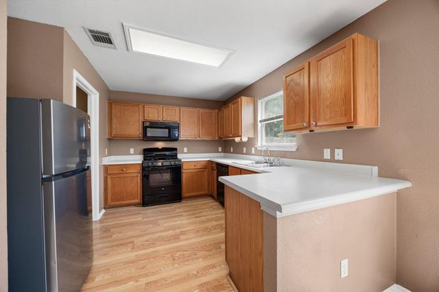 12033 Kilmartin LN, Austin, TX 78754