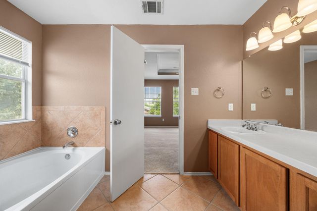 12033 Kilmartin LN, Austin, TX 78754