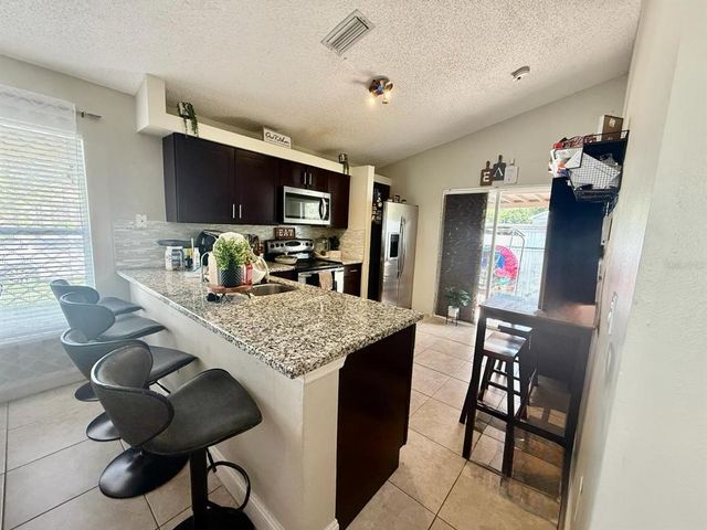 992 VISTA PALMA WAY, Orlando, FL 32825