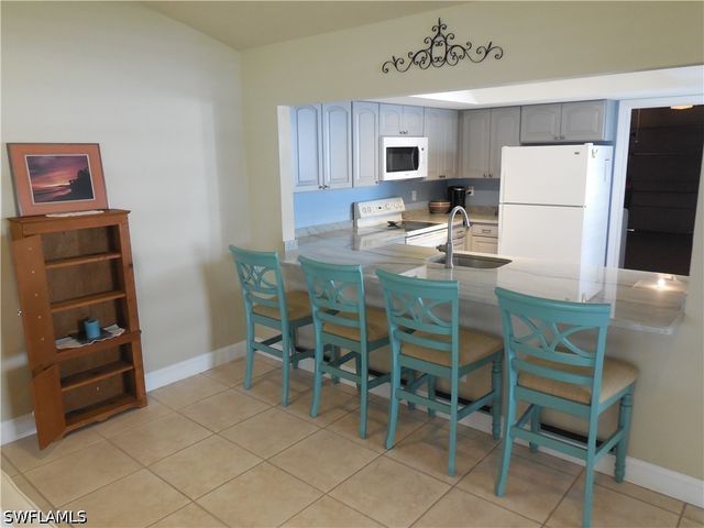 114 Quail Forest BLVD 7, Naples, FL 34105