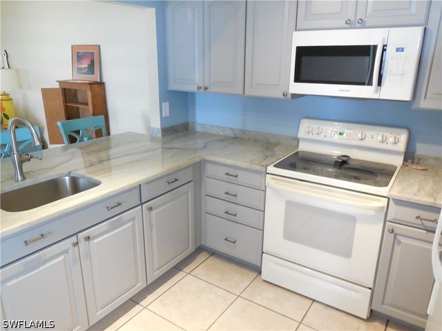 114 Quail Forest BLVD 7, Naples, FL 34105
