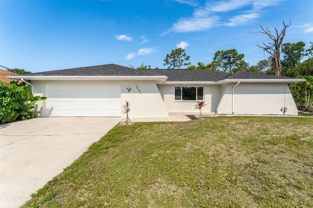 1231 BEACON DRIVE, Port Charlotte, FL 33952