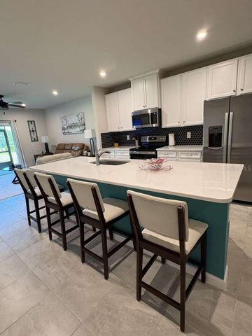 1982 W PALMS DRIVE, Port Charlotte, FL 33953