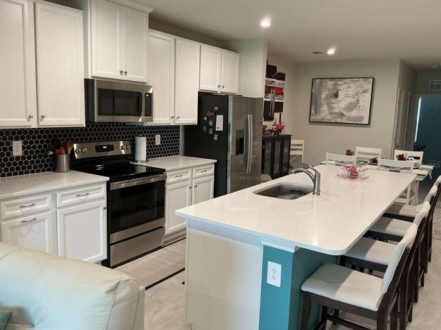 1982 W PALMS DRIVE, Port Charlotte, FL 33953