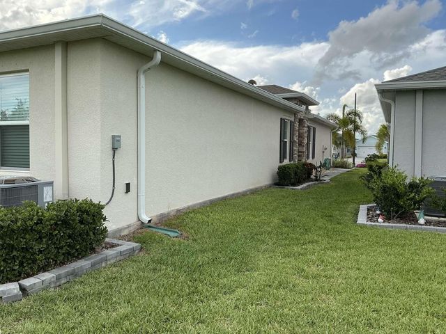 1982 W PALMS DRIVE, Port Charlotte, FL 33953