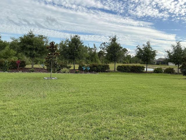 1982 W PALMS DRIVE, Port Charlotte, FL 33953