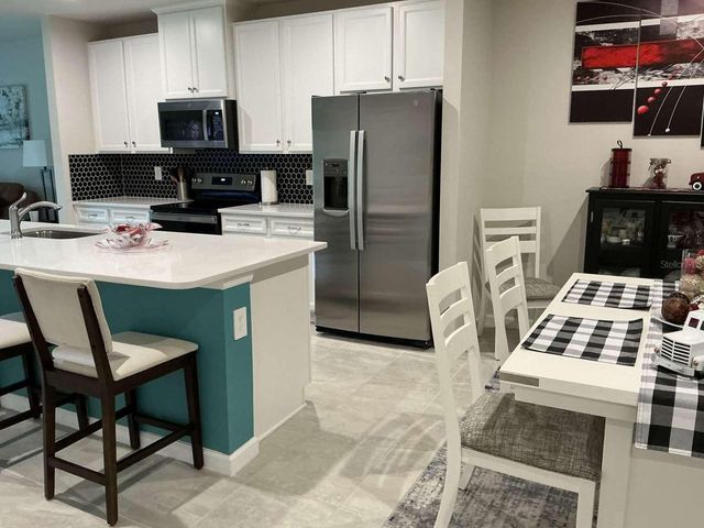 1982 W PALMS DRIVE, Port Charlotte, FL 33953