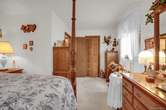 103 Wauwepex Trail, Ridge, NY 11961