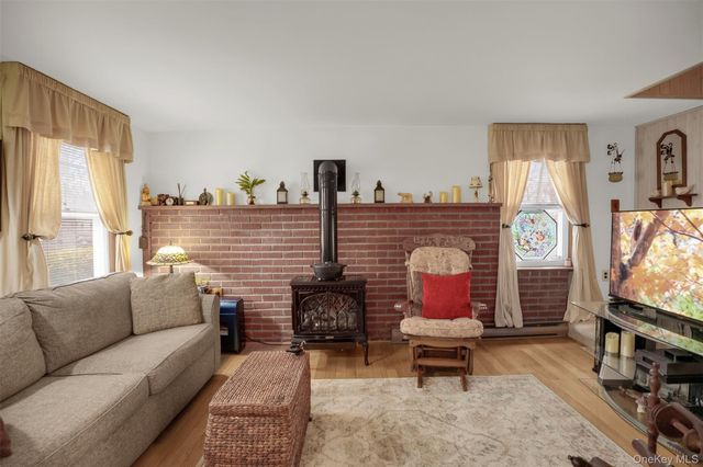 103 Wauwepex Trail, Ridge, NY 11961