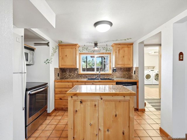 30402 Hilltop Dr, Evergreen, CO 80439