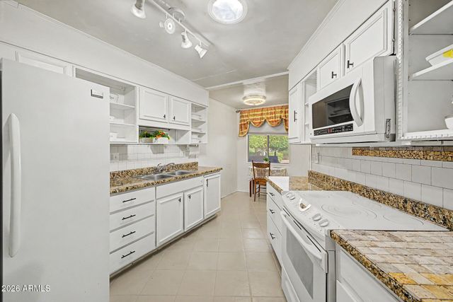 11078 W COGGINS Drive, Sun City, AZ 85351