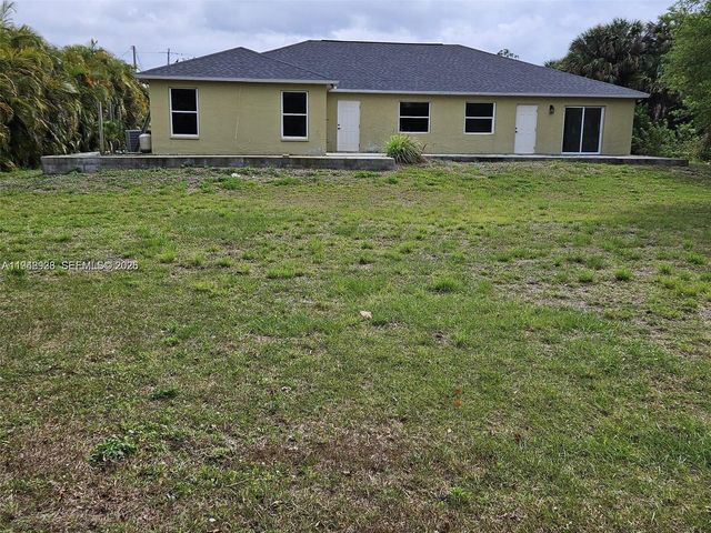 713 Palmetto Ave, Lehigh Acres, FL 33972
