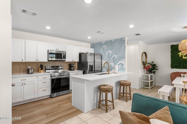 203 Romanza Place, Panama City Beach, FL 32413