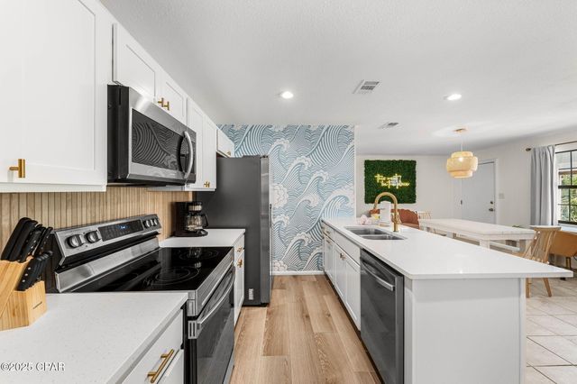 203 Romanza Place, Panama City Beach, FL 32413