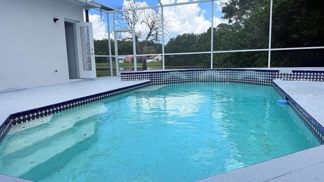 8708 MAPLE LAKE PLACE, Tampa, FL 33635