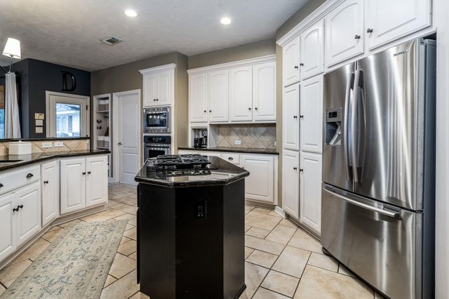 10411 Harnwell Crossing Drive, Spring, TX 77379