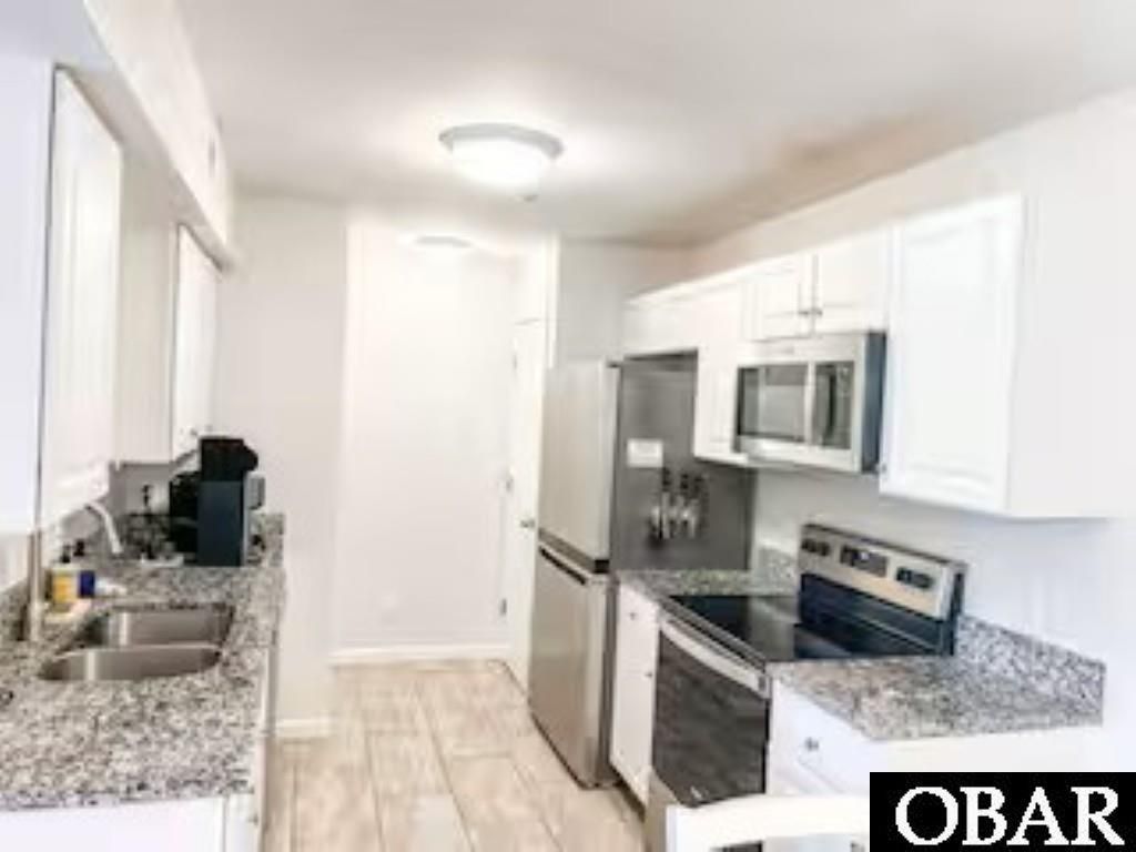 Image 5 of property listing at 814 Caroline Ct # G, Corolla, NC 27927