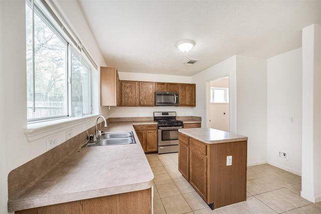 5019 Woodland Meadows Lane, Humble, TX 77346