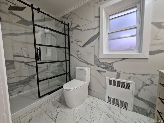 8019 UTOPIA Parkway, Jamaica Estates, NY 11432