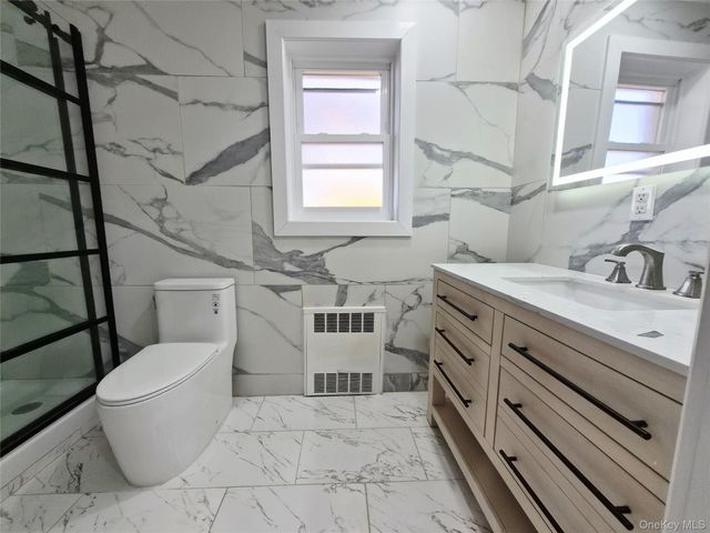 8019 UTOPIA Parkway, Jamaica Estates, NY 11432