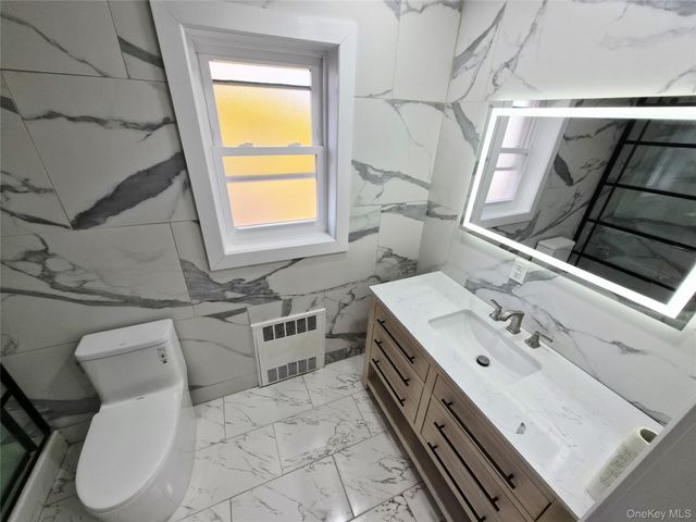 8019 UTOPIA Parkway, Jamaica Estates, NY 11432