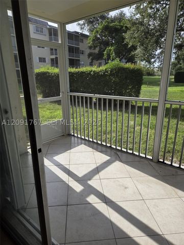 9101 W Sample Rd 102, Coral Springs, FL 33065