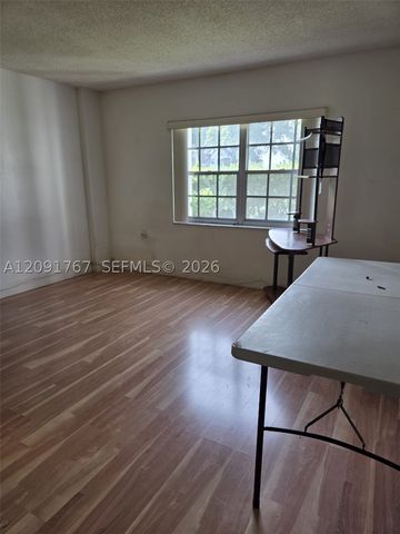 9101 W Sample Rd 102, Coral Springs, FL 33065