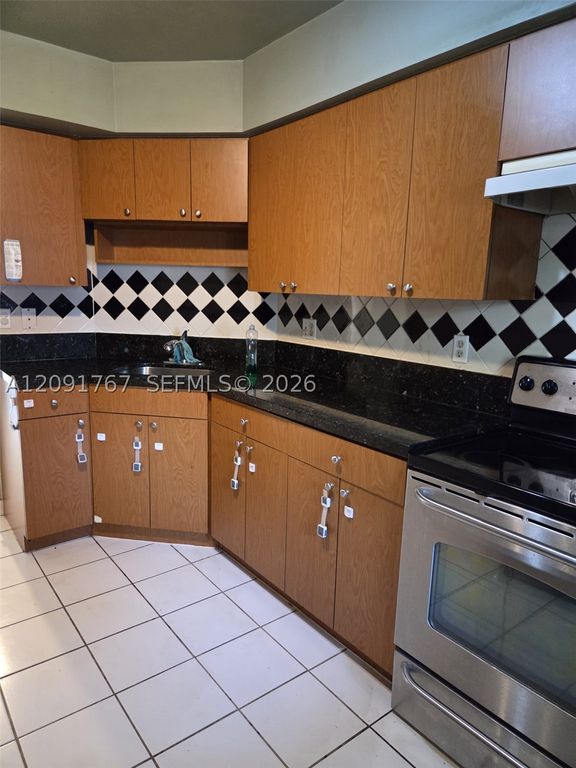 9101 W Sample Rd 102, Coral Springs, FL 33065