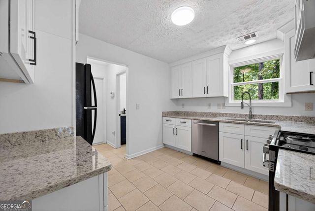 6898 Babbling Brook Drive, Rex, GA 30273