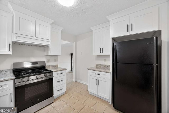 6898 Babbling Brook Drive, Rex, GA 30273