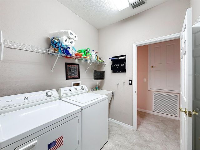 9833 SPRING LAKE DRIVE, Clermont, FL 34711