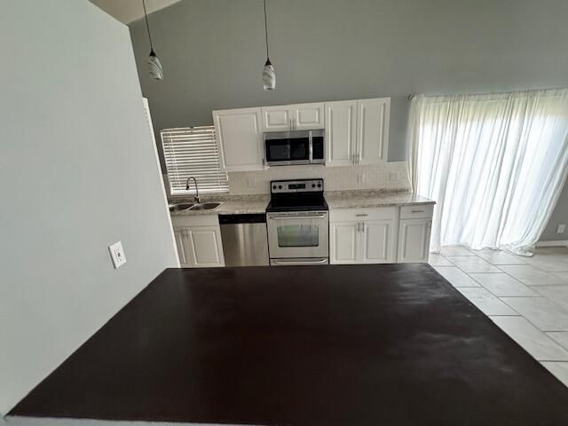 5202 NUTMEG Drive, Palm Beach Gardens, FL 33418