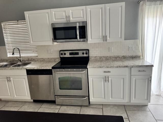 5202 NUTMEG Drive, Palm Beach Gardens, FL 33418
