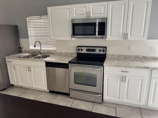 5202 NUTMEG Drive, Palm Beach Gardens, FL 33418