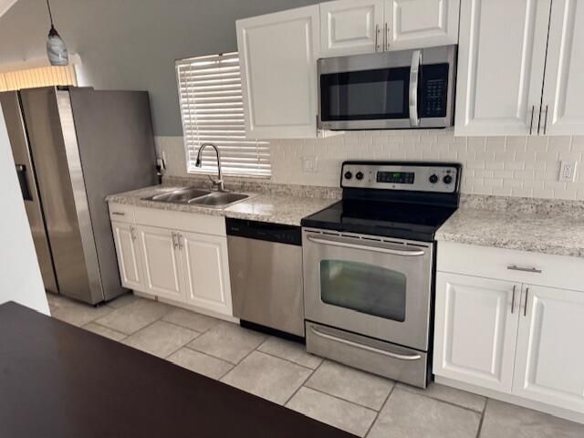 5202 NUTMEG Drive, Palm Beach Gardens, FL 33418