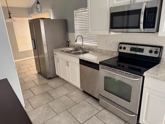 5202 NUTMEG Drive, Palm Beach Gardens, FL 33418