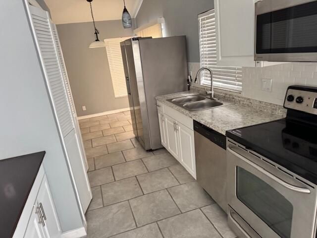 5202 NUTMEG Drive, Palm Beach Gardens, FL 33418