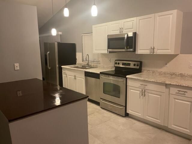 5202 NUTMEG Drive, Palm Beach Gardens, FL 33418