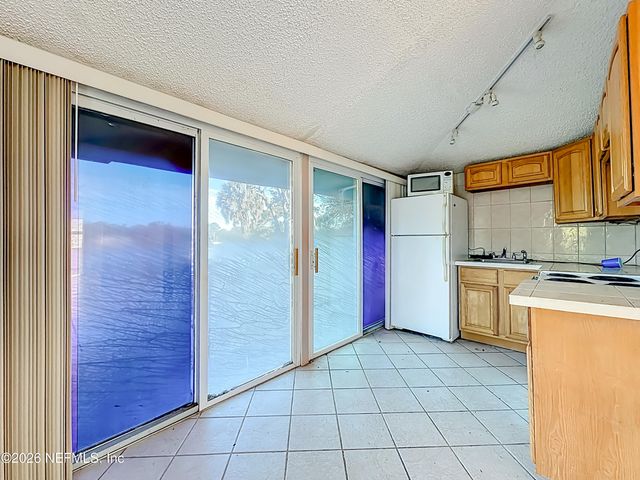 7702 N NORTH SHORE Drive, Jacksonville, FL 32208