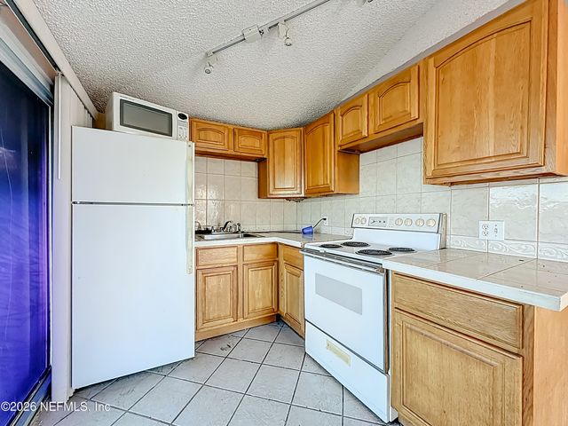 7702 N NORTH SHORE Drive, Jacksonville, FL 32208