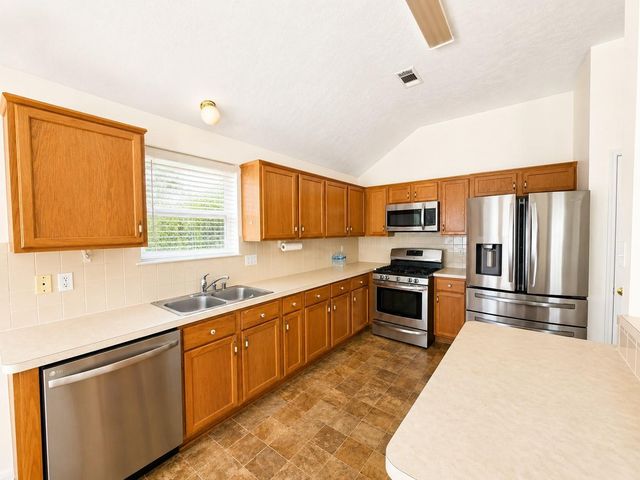 6858 Stillwater Drive, Willis, TX 77318